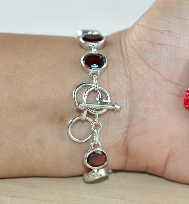 Oval Garnet Bracelet in Sterling Silver